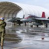 A Navy Hornet taxis in during the change of command ceremony.